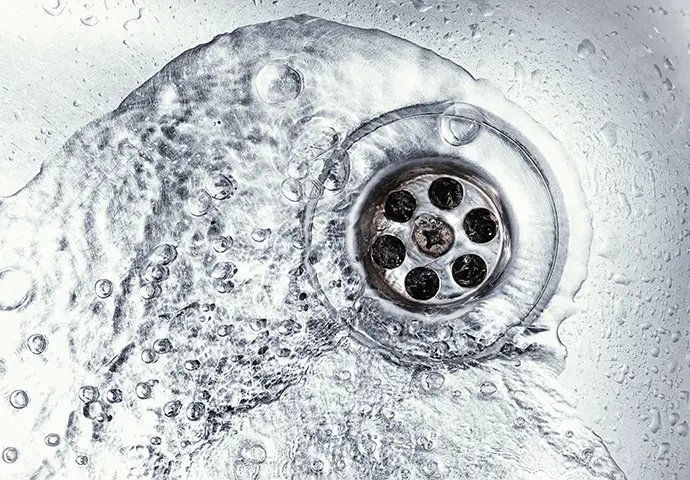 slow draining drain needing drain cleaning services